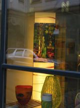 A picture of the light-column “In the summer forest 1” taken through the display window (2)
