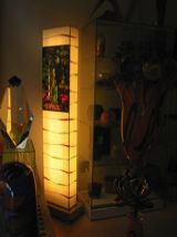 A picture of the light-column “In the summer forest 1” taken through the display window (1)